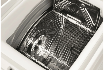 Стиральная машина с вертикальной загрузкой Whirlpool TDLR 65210 белый